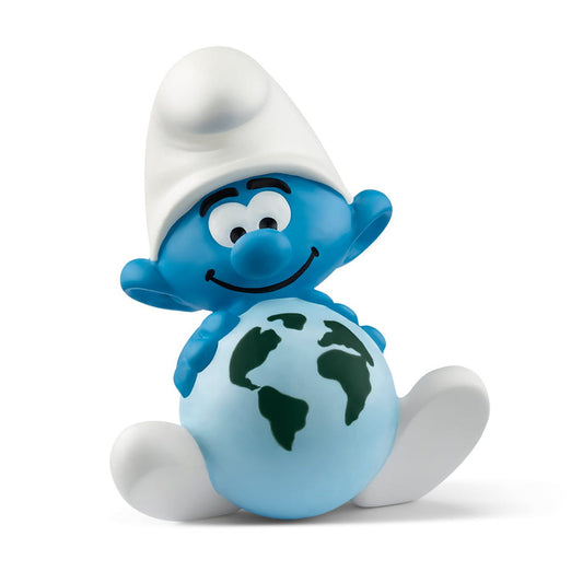 A toy figurine of a blue smurf character sitting next to a stylized globe with blue oceans and green landmasses.