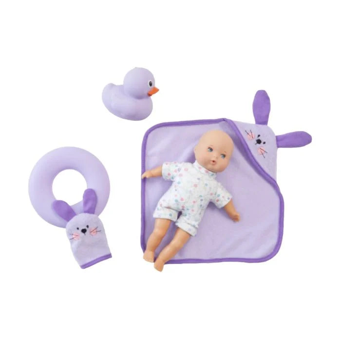A set of lavender-colored children's bath toys including a floaty ring, hooded towel, wash mitt, and a duck toy.