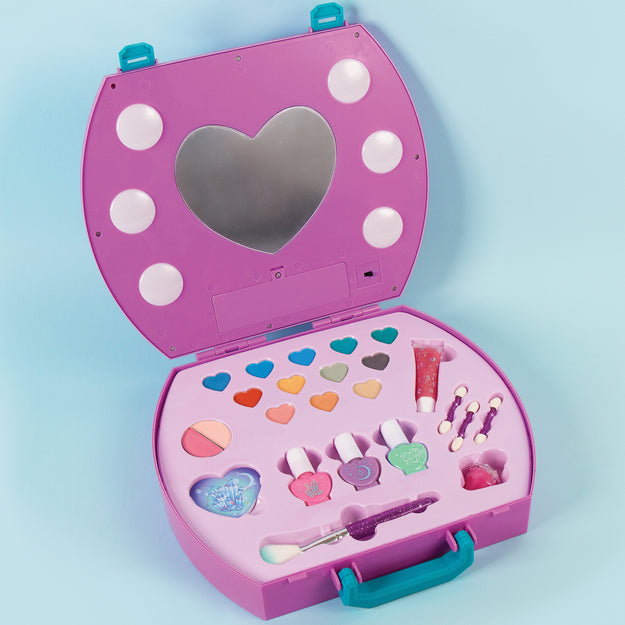 LIGHT UP COSMETIC STUDIO-Toys-Make It Real-This glam heart-shaped case features an illuminated mirror and all the fun dress-up cosmetics needed to create bright, picture-perfect manis and matching makeup looks.Includes:1 light-up cosmetic case with mirror12 colors of eyeshadow3 eyeshadow brushes2 blush colors1 blush brush3 colors of nail polish1 lip gloss1 lip gloss solid1 nail file1 instruction sheet-Kidz Toys
