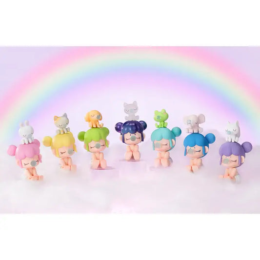 A series of colorful, anime-style figurines labeled as 'Rolife Baby Nanci', each with different hair colors and outfits, standing against a rainbow-colored background.