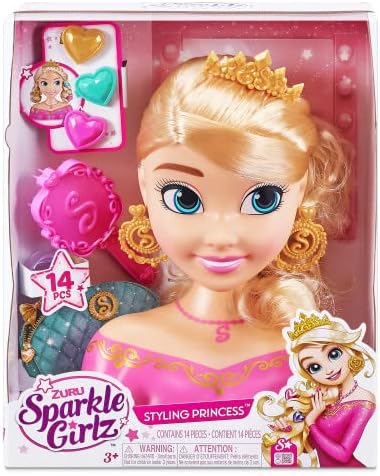 Packaged Zuru Sparkle Girlz Styling Head with rooted hair, wearing a tiara and earrings, with a pink and gold outfit, displayed in a sparkly packaging.