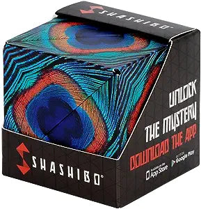A shashibo sensory cube with a peacock feather design in a box.