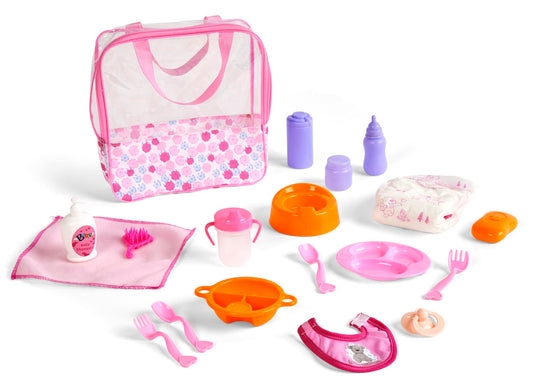 Set of toy dining and travel accessories including a pink bag, bowls, cups, and utensils on a white background.