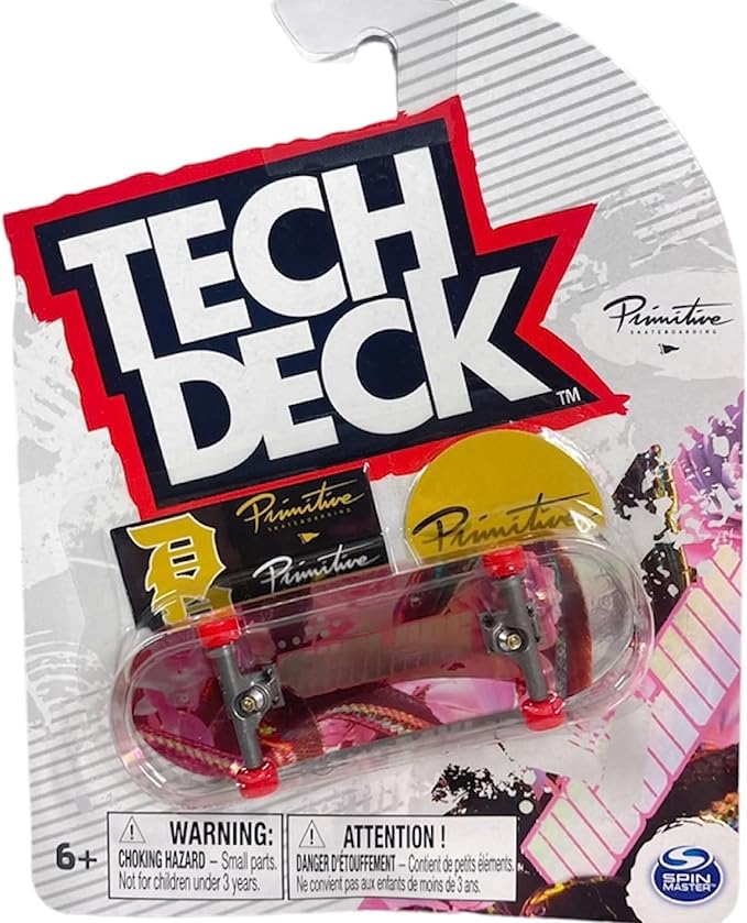 Packaged Tech Deck 96mm Fingerboard with red and black colors and visible Tech Deck branding.