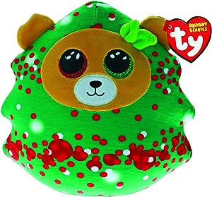 A green plush toy resembling a bear with a Christmas tree design, featuring red and white dots and a bow on its stomach.