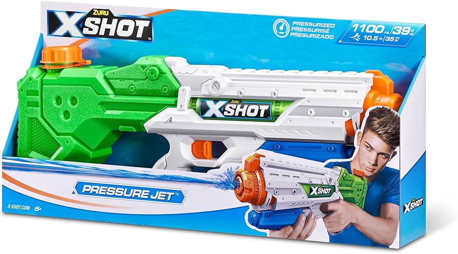 Zuru X-Shot Water Warfare Pressure Jet Water Blaster toy in packaging, predominantly green and white with orange accents, displayed with a blurred image of a person in the background.