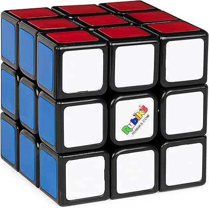 Rubik's 3x3 Cube-Toys-Spin Master-THE ORIGINAL RUBIK’S CUBE: A combination of math, art, & science- the iconic Rubik’s Cube is here to challenge your mind. The 3x3 Cube is the world’s best-known puzzle and has fascinated fans since its 1980 launch. TWIST, TURN, LEARN: The Rubik’s Cube features 6 colored sides, each made up of 9 squares. Once the sides are jumbled up, you twist, turn, and rotate the Cube until each of the 6 sides has only 1 color. GREAT FOR ANXIETY RELIEF: This fidget toy pack is not only a