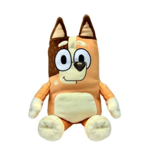 A plush toy resembling a cartoon fox with a happy facial expression, primarily orange in color with beige accents, and white and black eyes and fur. Bluey show Chilli dog