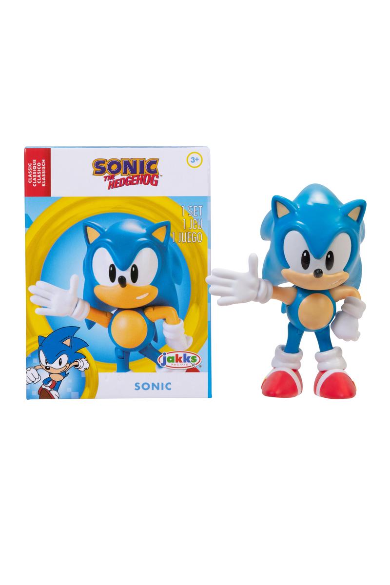 Articulated Sonic the Hedgehog figure with multiple points of articulation, including the arms, legs, and head. The figure is blue with white and yellow accents, and it is displayed alongside its packaging which has the Sonic the Hedgehog logo and colors.