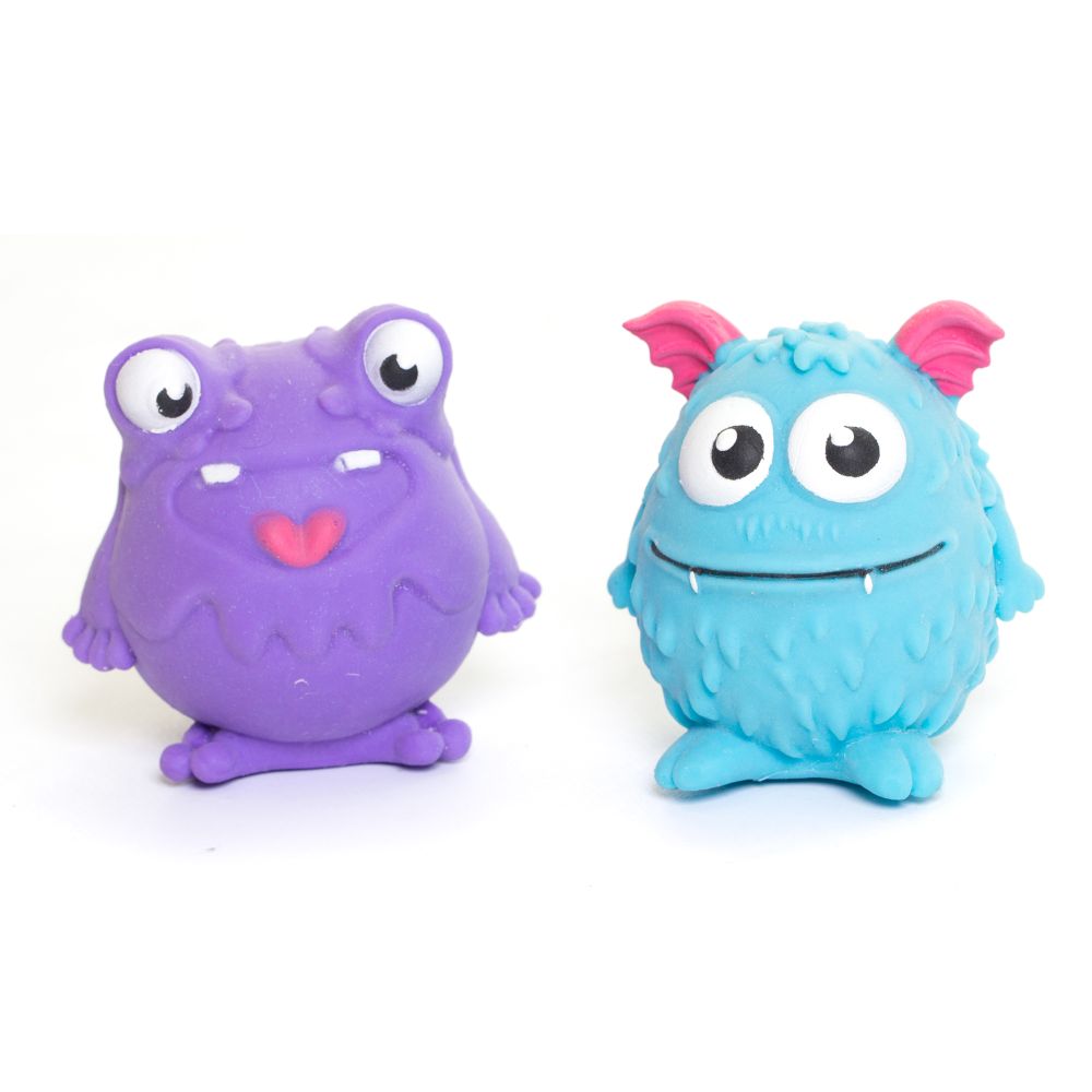 Two toy figures resembling cute, colorful monsters with large eyes, one in purple and one in blue.