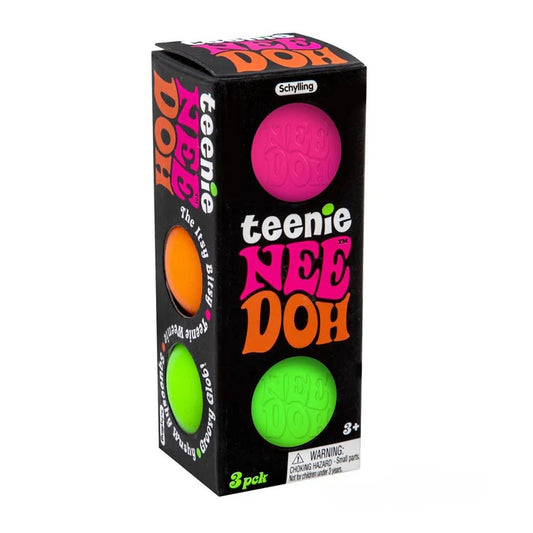 A box of TEENIE NEE DOH fidget toys, featuring three colorful rubber balls in green, orange, and pink, and a black background with bold lettering.