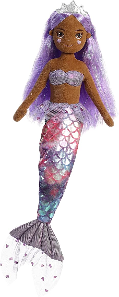 A plush doll resembling a mermaid with a multicolored tail and purple hair, wearing a pink and purple outfit, and with a sparkly finish.