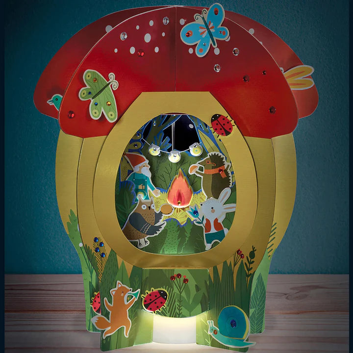 Lantern Lands Forest Festival-Arts & Crafts-Bright Stripes-Lantern Lands is a paper-based DIY lantern with a magical scene inside! Slot the precut pieces together and decorate with punchouts, puffy stickers and gems. An LED tea light provides the glow. Customize the forest scene inside the mushroom with whimsical character punchouts and stickers!-Kidz Toys