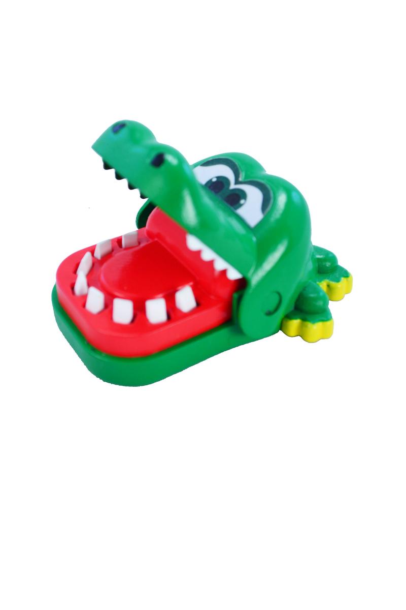 World's Smallest Crocodile Dentist-Toys-Super Impulse USA-World's Smallest Crocodile Dentist The world’s smallest version of the popular game of nerves and luck. Open the Croc’s mouth wide, and “examine” his teeth by pressing down on them one by one. But watch out! Be the player to press on the crocodile’s sore tooth and you’ll get chomped! Ages 6 and up.-Kidz Toys