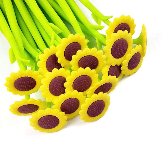 A gel pen with a yellow and purple flower design on the caps, resembling a sunflower, ladybug, and bee.