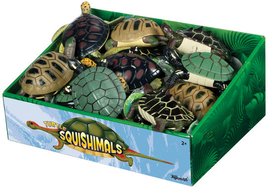 A box of various turtle-shaped stretchy toys, filled with sand, designed for children.