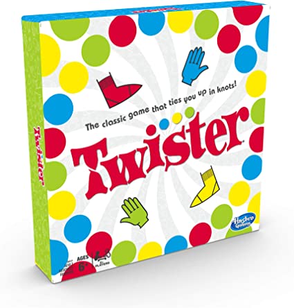 The image shows the packaging of the Twister game with colorful polka dots and illustrations of hands and feet in various colors.